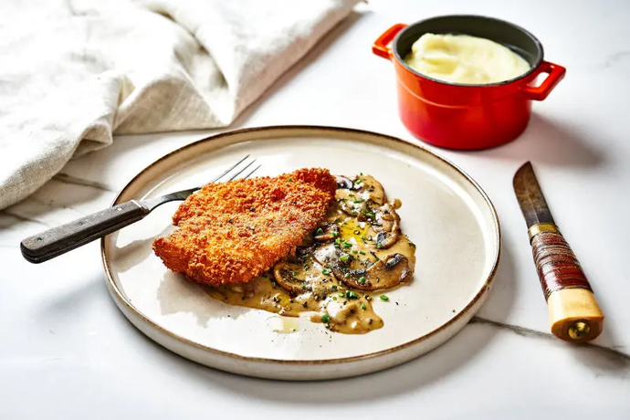 Rapeaksi paistettua kananpoikaa chasseur